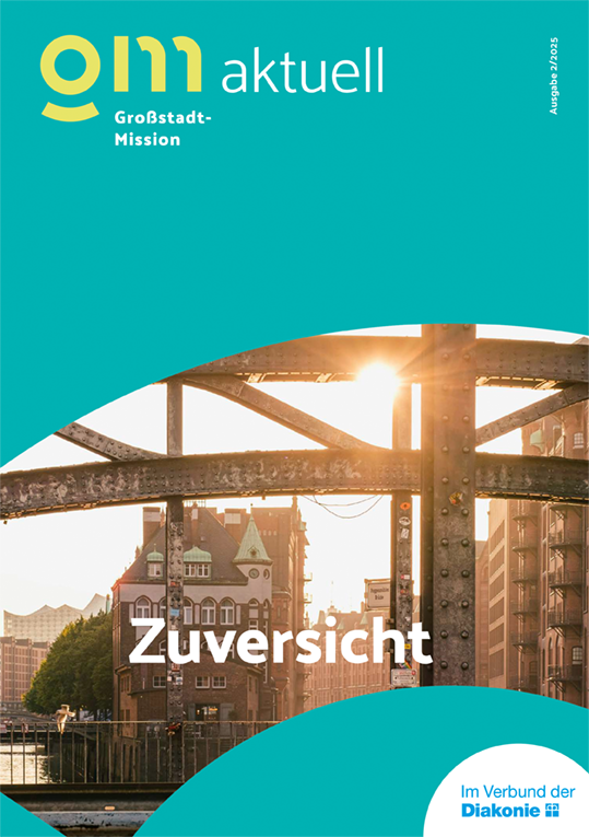 Heft-Titelbild mit Foto einer Orchidee und dem Schriftzug "Ein Zuhause geben"